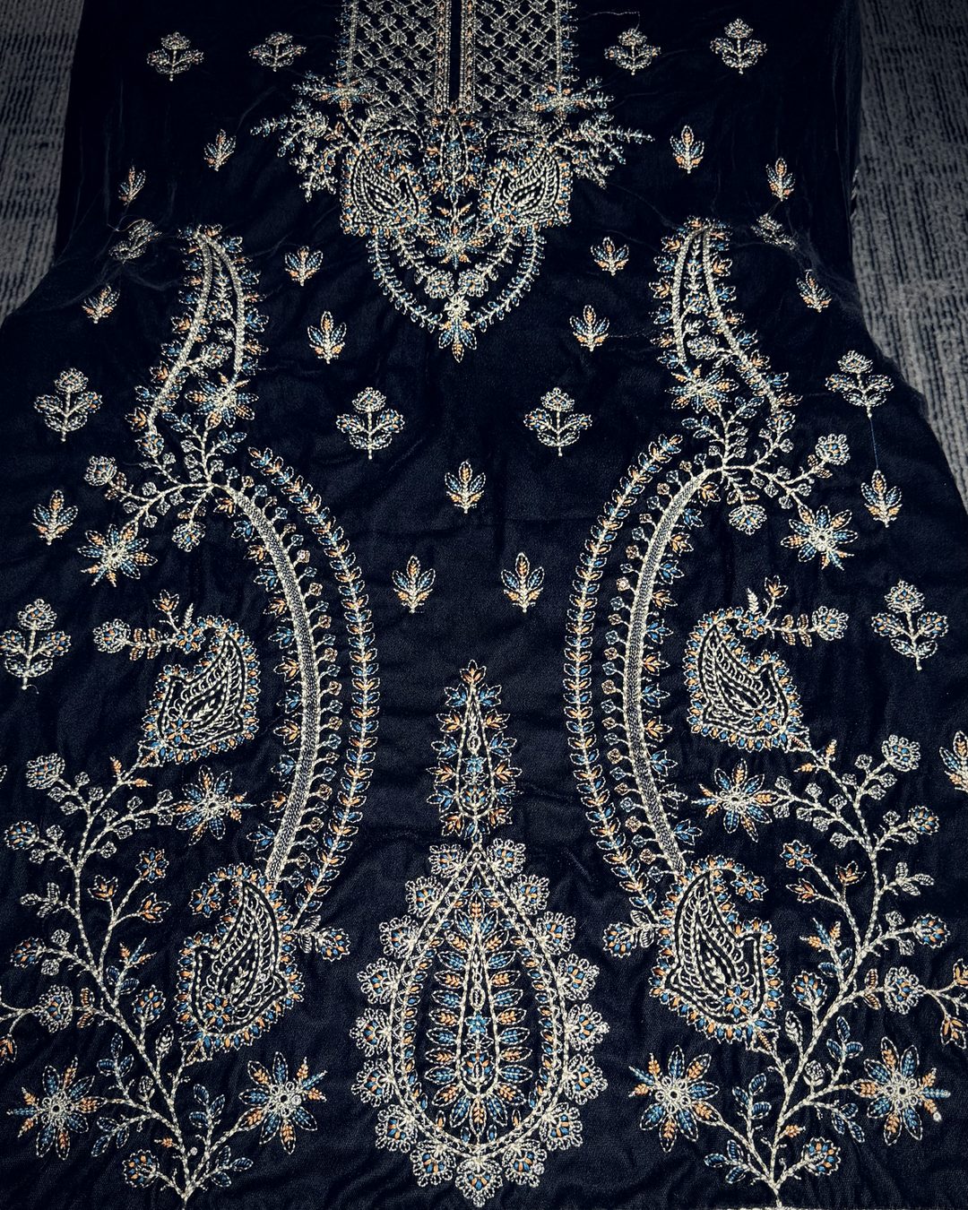 Approved paisley shirt front in silver and blue thread on black velvet