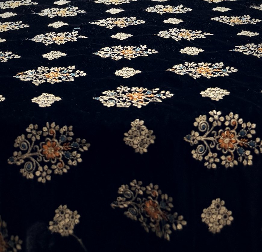 Black velvet with gold and copper floral motifs